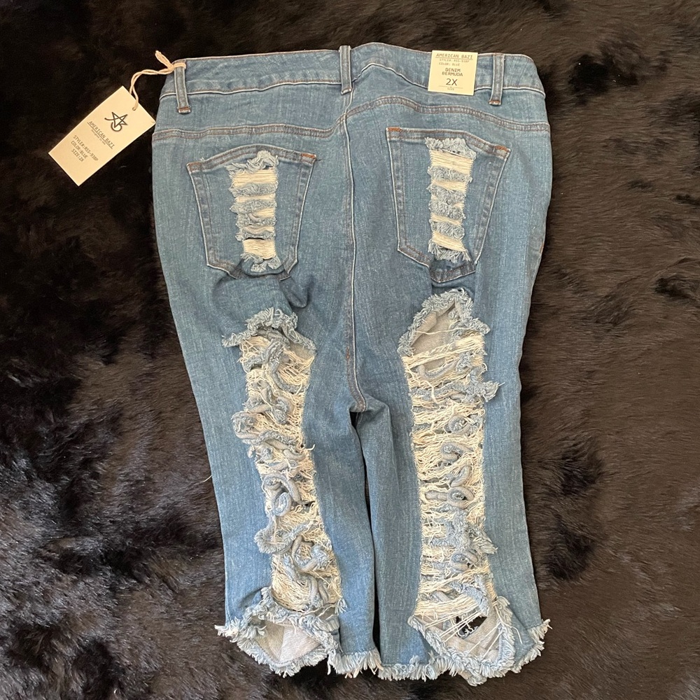 Sexy ripped denim Bermuda shorts